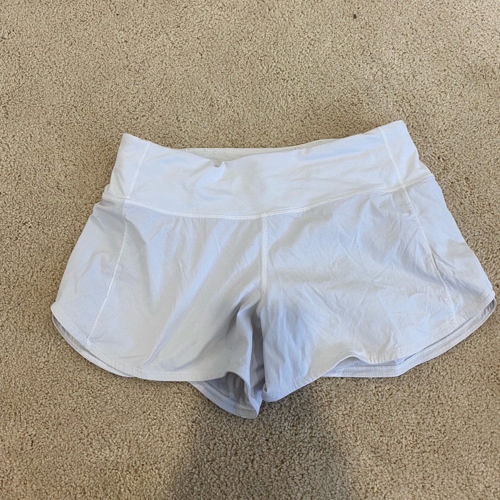white lululemon shorts speed ups! 4 inch mid rise